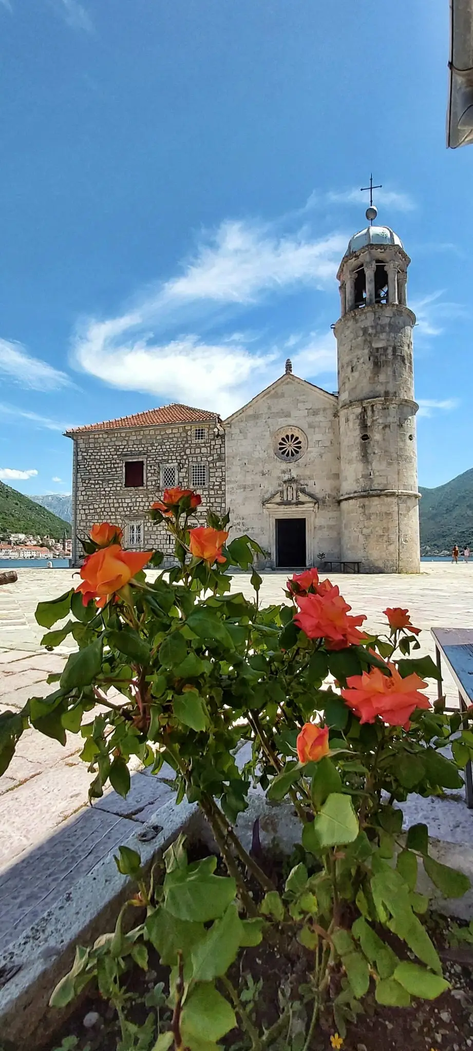 Church and bell tower on Our Lady of the Rocks island, Bay of Kotor