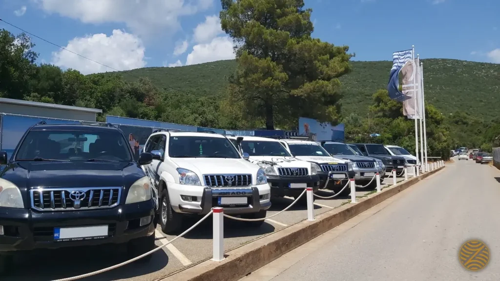 A fleet of 4×4 vehicles lined up for a group off-road day on the Luštica peninsula, Montenegro