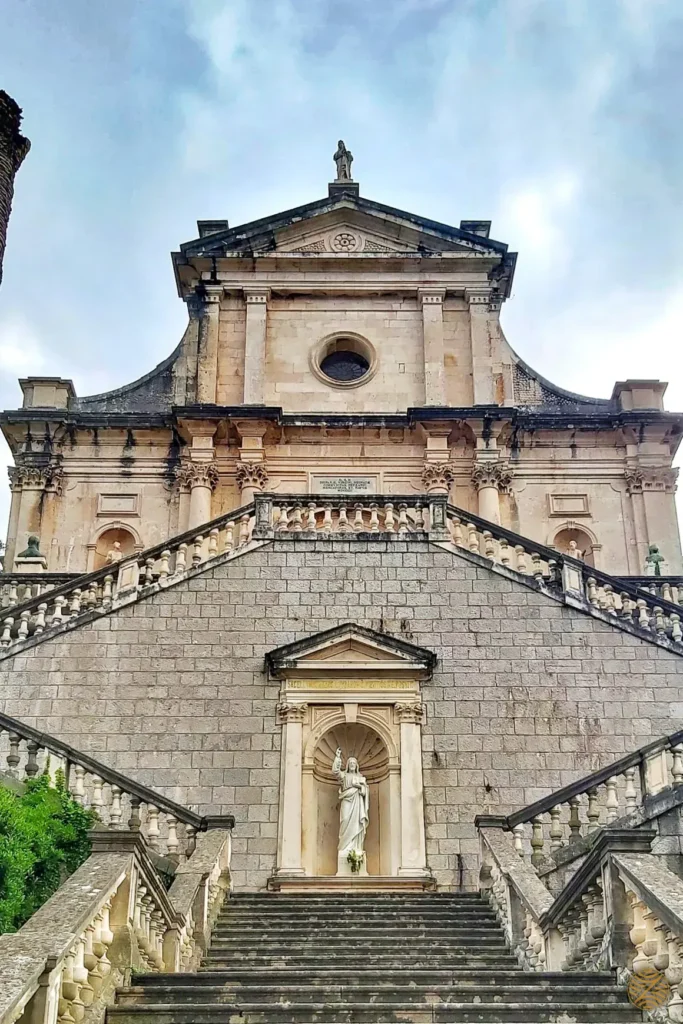The baroque staircase and façade of the Church of the Birth of the Virgin Mary in Prčanj, Bay of Kotor