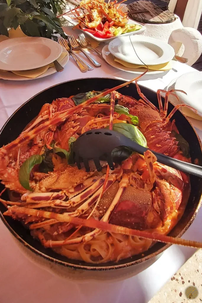 Lobster pasta served in a stone courtyard, Montenegro