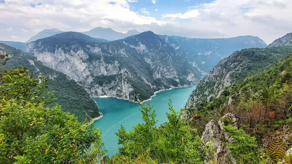 Turquoise Piva Lake between steep canyon walls in northern Montenegro