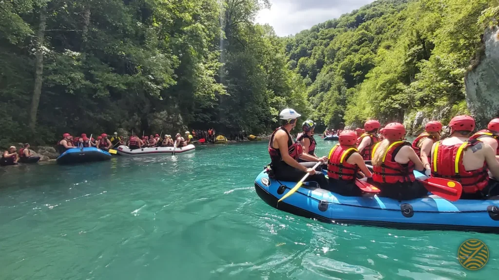 Rafting groups on the turquoise Tara River in the Tara Canyon