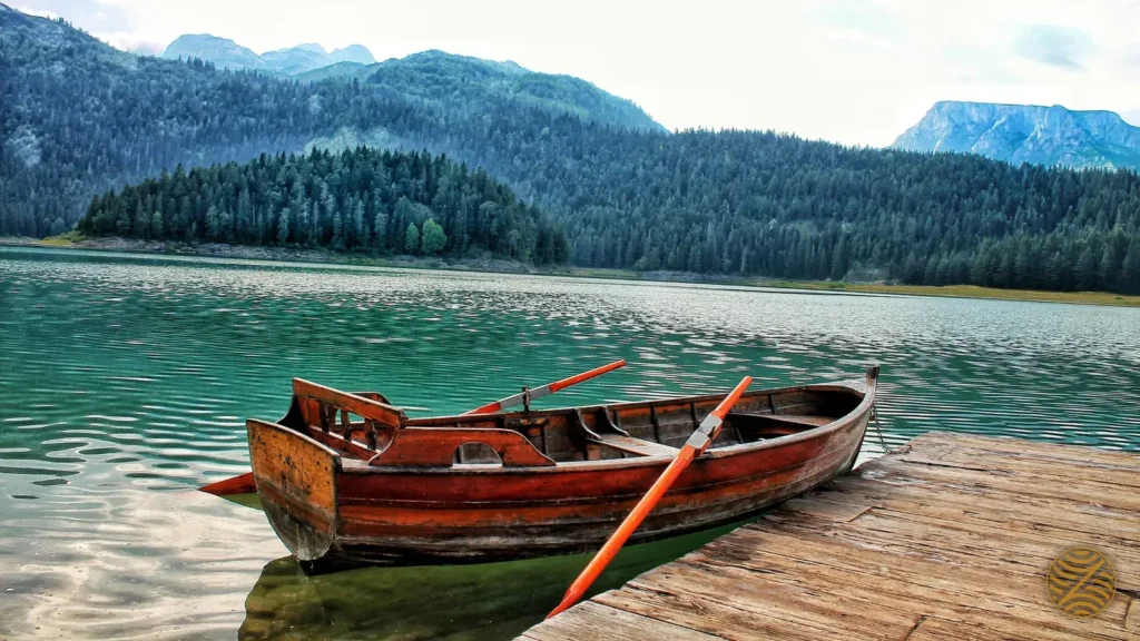 Wooden rowing boat at a jetty on Black Lake, Durmitor National Park