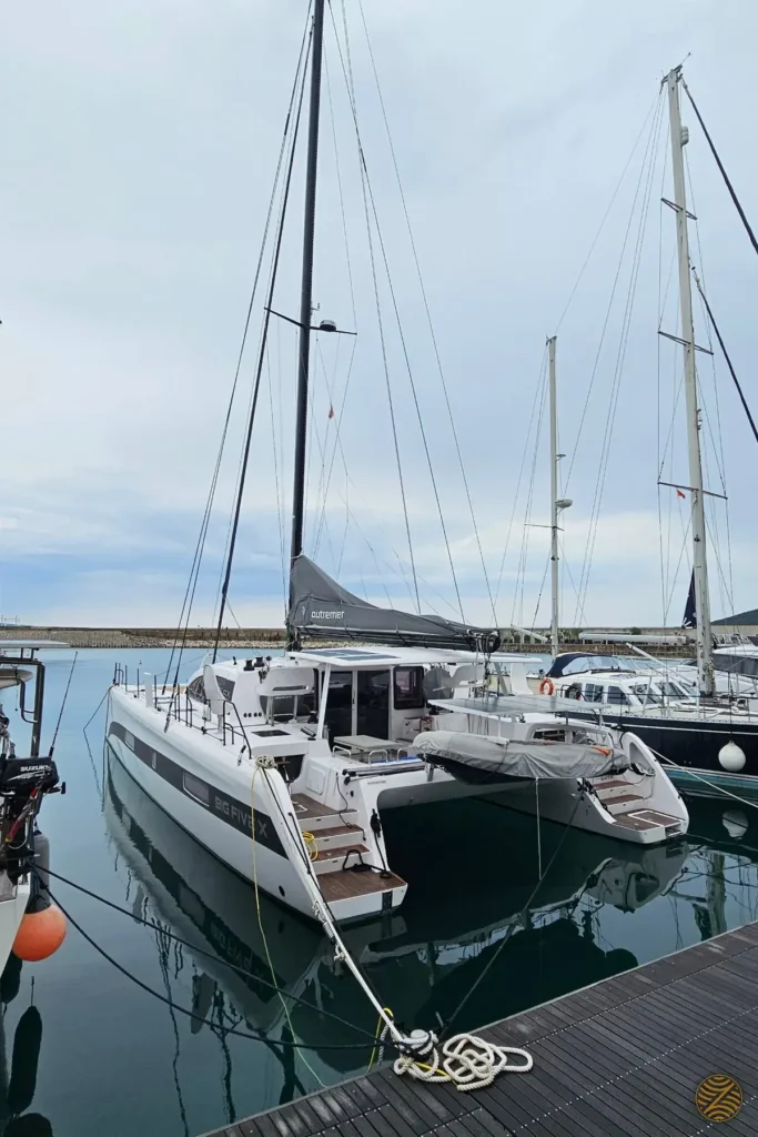 Sailing catamaran moored at Luštica Bay Marina on the Adriatic coast of Montenegro